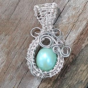 Handmade silver coated swirly mini pendant